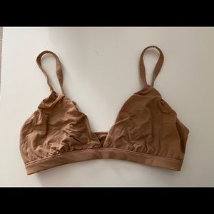 SKIMS fits everybody triangle bralette in color Sienna